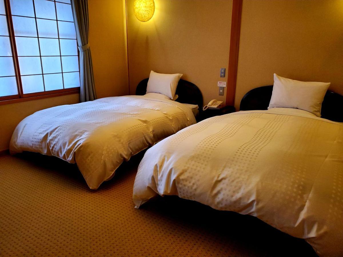 Hotel Ryotei Tanokura Yufu Exterior foto