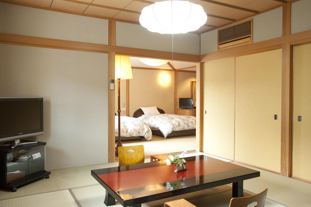 Hotel Ryotei Tanokura Yufu Exterior foto